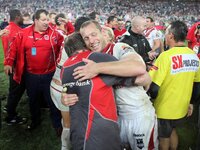 Ray Connelly embraces Ben Hornby